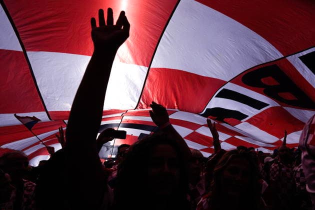 June 23, 2026, Toronto, On, CAN: Croatia fans hold aloft a giant flag as they march to Toronto Stadium ahead of their FIFA 2026 World Cup group stage match against Panama in Toronto on Tuesday, June 23, 2026. Canada News - June 23, 2026  - ZUMAc35_ 20260623_zaf_c35_098 Copyright: xChrisxYoungx