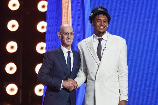NBA, Basketball Herren, USA Draft round one at Barclays Center NBA commissioner Adam Silver (L) and American basketball player Yaxel Lendeborg pose for a picture after he was drafted by the Golden State Warriors during the first round of the 2026 NBA Draft at the Barclays Center in the Brooklyn borough of New York, New York, USA, 23 June 2026. NEW YORK NEW YORK United States  Copyright: xSARAHxYENESELx