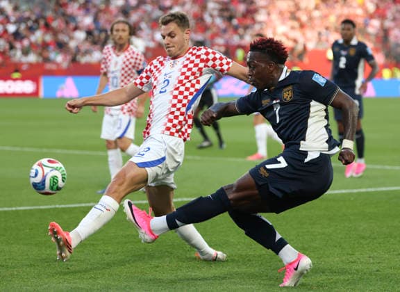 (260624) -- TORONTO, June 24, 2026 -- Josip Stanisic (front L) of Croatia vies with Jose Luis Rodriguez (front R) of Panama during the group L match between Croatia and Panama at the 2026 FIFA World Cup, WM, Weltmeisterschaft, Fussball at Toronto Stadium in Toronto, Canada, on June 23, 2026. (Photo by Xinhua) (SP)CANADA-TORONTO-FOOTBALL-FIFA WORLD CUP-GROUP L-CRO VS PAN ZouxZheng 
