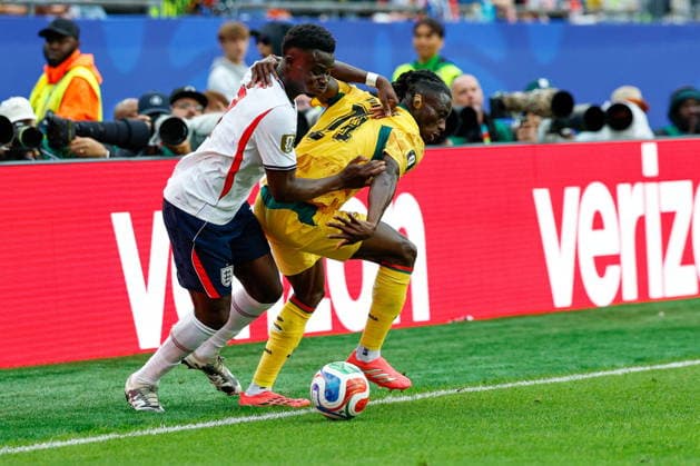 BOSTON STADIUM FOXBOROUGH MASSACHUSETTS USA 23.06.2026 FIFA MISTRZOSTWA SWIATA 2026 W PILKA NOZNA W USA MECZ GRUPA L ENGLAND I AND GHANA FIFA World Cup, WM, Weltmeisterschaft, Fussball 2026 Group L match between England and Ghana at Boston Stadium in Foxborough, Massachusetts on June 23, 2026 N Z England forward Bukayo Saka (7) Ghana defender Gideon Mensah (14) KAMIL KRZACZYNSKI NEWSPIX.PL --- newspix.pl POLAND OUT!  KSK