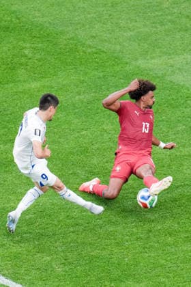 Odiljon Hamrobekov of Uzbekistan (L) shoots for goal under pressure from Renato Veiga of Portugal (R) during a FIFA Men’s World Cup 2026 Group Stage football match between Portugal and Uzbekistan at Houston Stadium, in Houston on June 23th 2026 (Photo by Alexandra Fechete SPP)  Copyright: xAlexandraxFechete SPPx Sportspressphoto_SPR174382