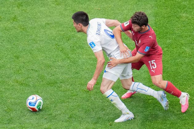 Odiljon Hamrobekov of Uzbekistan (L) runs with the ball under pressure from Joao Neves of Portugal (R) during a FIFA Men’s World Cup 2026 Group Stage football match between Portugal and Uzbekistan at Houston Stadium, in Houston on June 23th 2026 (Photo by Alexandra Fechete SPP)  Copyright: xAlexandraxFechete SPPx Sportspressphoto_SPR174383