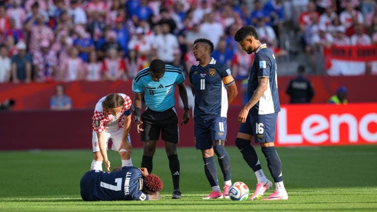 June 23, 2026, Toronto, Ontario, Canada: Jose Luis Rodriguez ( 7) of Panama is checked on by Ante Budimir ( 10) of Croatia and referee Pierre Ghislain Atcho of Gabon during the 2026 FIFA World Cup, WM, Weltmeisterschaft, Fussball game between Panama and Croatia at Toronto Stadium. Croatia won the match 1-0. Sports News - June 23, 2026  - ZUMAv136 20260623_zsp_v136_054 Copyright: xJeffxVoganx