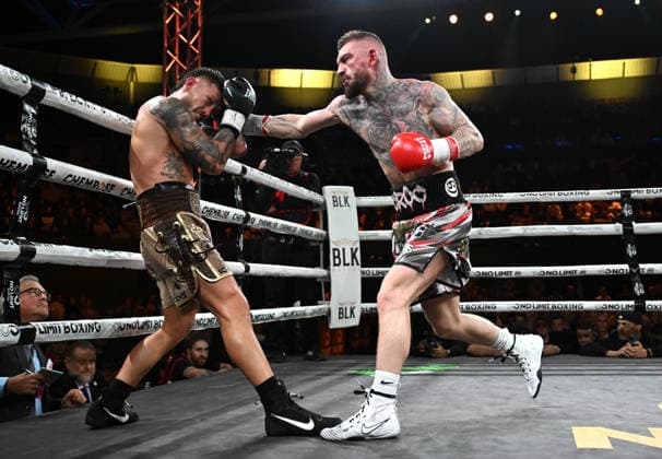 BOXING PARO CROCKER, Liam Paro (left) of Australia in action against Lewis Crocker (right) of Northern Ireland during the IBF Welterweight World Title fight at Pat Rafter Arena in Brisbane, Wednesday, June 24, 2026. ( NO ARCHIVING, EDITORIAL USE ONLY BRISBANE QUEENSLAND AUSTRALIA  Copyright: xDARRENxENGLANDx 20260624170192175600