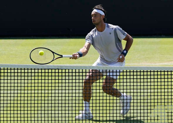 RECORD DATE NOT STATED 24th June 2026; Devonshire Park Lawn Tennis Club, Eastbourne, East Sussex, England; Lexus Eastbourne Open Tennis, Day Four; Thiago Agustin Tirante (ARG) plays a forehand shot against Toby Samuel (GBR) HongboxChen