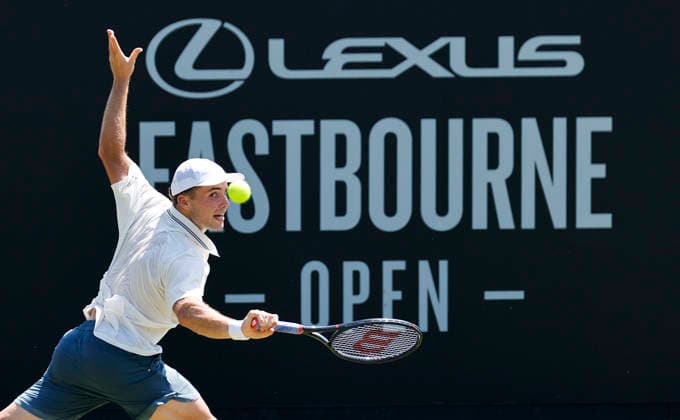RECORD DATE NOT STATED 24th June 2026; Devonshire Park Lawn Tennis Club, Eastbourne, East Sussex, England; Lexus Eastbourne Open Tennis, Day Four; Arthur Fery (GBR) plays a backhand shot against Juan Manuel Cerundoli (ARG) HongboxChen