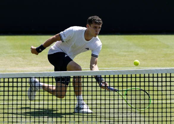 RECORD DATE NOT STATED 24th June 2026; Devonshire Park Lawn Tennis Club, Eastbourne, East Sussex, England; Lexus Eastbourne Open Tennis, Day Four; Juan Manuel Cerundoli (ARG) plays a forehand shot against Arthur Fery (GBR) HongboxChen