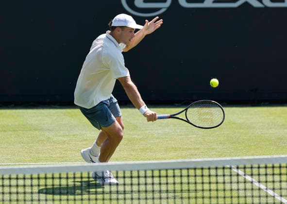 RECORD DATE NOT STATED 24th June 2026; Devonshire Park Lawn Tennis Club, Eastbourne, East Sussex, England; Lexus Eastbourne Open Tennis, Day Four; Arthur Fery (GBR) plays a backhand shot against Juan Manuel Cerundoli (ARG) HongboxChen