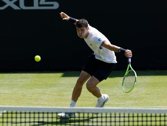 RECORD DATE NOT STATED 24th June 2026; Devonshire Park Lawn Tennis Club, Eastbourne, East Sussex, England; Lexus Eastbourne Open Tennis, Day Four; Juan Manuel Cerundoli (ARG) plays a backhand shot against Arthur Fery (GBR) HongboxChen