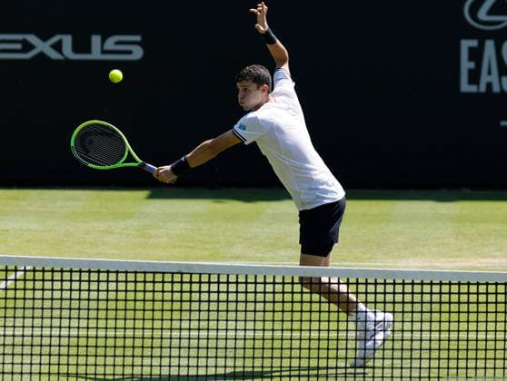 RECORD DATE NOT STATED 24th June 2026; Devonshire Park Lawn Tennis Club, Eastbourne, East Sussex, England; Lexus Eastbourne Open Tennis, Day Four; Juan Manuel Cerundoli (ARG) plays a backhand shot against Arthur Fery (GBR) HongboxChen