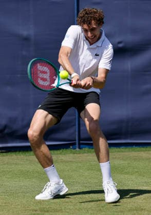 RECORD DATE NOT STATED 24th June 2026; Devonshire Park Lawn Tennis Club, Eastbourne, East Sussex, England; Lexus Eastbourne Open Tennis, Day Four; Ugo Humert (GBR) plays a backhand shot against Jenson Brooksby (USA) HongboxChen