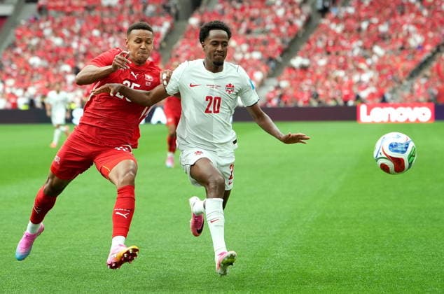 FIFA World Cup, WM, Weltmeisterschaft, Fussball 2026 - Group B - Switzerland vs Canada Luca Jaquez of Switzerland (L) in action against Ali Ahmed of Canada during the FIFA World Cup 2026 group stage match Switzerland against Canada, in Vancouver, Canada, 24 June 2026. VANCOUVER Canada  Copyright: xBOBxFRIDx