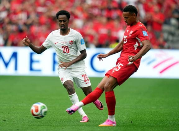 FIFA World Cup, WM, Weltmeisterschaft, Fussball 2026 - Group B - Switzerland vs Canada Luca Jaquez of Switzerland (R) in action against Ali Ahmed of Canada during the FIFA World Cup 2026 group stage match Switzerland against Canada, in Vancouver, Canada, 24 June 2026. VANCOUVER Canada  Copyright: xBOBxFRIDx