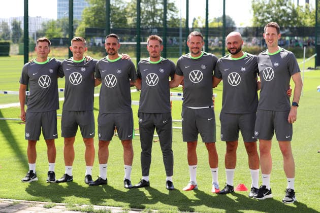 VfL Wolfsburg Training Kickoff, June 24, 2026, Soccer, Men s, 2026–2027 Season, 2. Bundesliga, VfL Wolfsburg, Training Kickoff, from left: Fitness Coach Johannes Engert (VfL Wolfsburg), Assistant Coach Sergej Schmik (VfL Wolfsburg), Assistant Coach Jerome Polenz (VfL Wolfsburg), Head Coach Tobias Strobl (VfL Wolfsburg), Goalkeeper Coach Pascal Formann (VfL Wolfsburg), Assistant Coach Murat Ural (VfL Wolfsburg), Head of Match Analysis Martin Raschick (VfL Wolfsburg), Lower Saxony, Germany