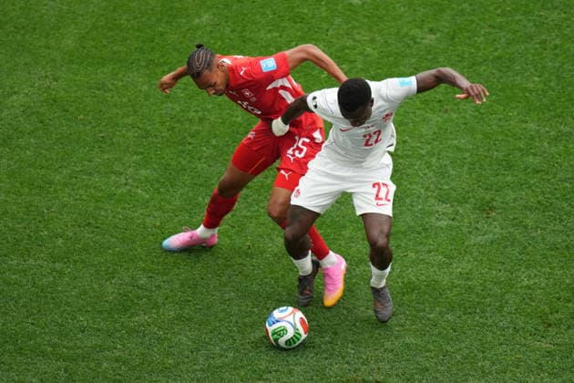 Switzerland v Canada - FIFA World Cup, WM, Weltmeisterschaft, Fussball 2026 - Group B VANCOUVER, CANADA - JUNE 24: Luca Jaquez (L) of Switzerland in action Richie Laryea of Canada during the 2026 FIFA World Cup Group B match between Switzerland and Canada at BC Place Stadium in Vancouver, Canada, on June 24, 2026. Ercin Erturk Anadolu British Columbia Canada. Editorial use only. Please get in touch for any other usage.  Copyright: x2026xAnadoluxErcinxErturkx