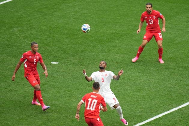 Switzerland v Canada - FIFA World Cup, WM, Weltmeisterschaft, Fussball 2026 - Group B VANCOUVER, CANADA - JUNE 24: Akanji (L) and Xhaka (10) of Switzerland in action against Larin (9) of Canada during the 2026 FIFA World Cup Group B match between Switzerland and Canada at BC Place Stadium in Vancouver, Canada, on June 24, 2026. Ercin Erturk Anadolu British Columbia Canada. Editorial use only. Please get in touch for any other usage.  Copyright: x2026xAnadoluxErcinxErturkx