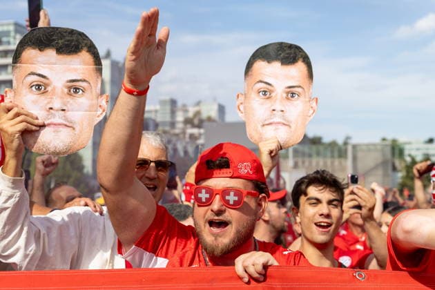 June 24, 2026, Vancouver, Bc, CANADA: Switzerland fans march toward B.C. Place before a World Cup Group B soccer match against Canada, in Vancouver, on Wednesday, June 24, 2026. Canada News - June 24, 2026  - ZUMAc35_ 20260624_zaf_c35_057 Copyright: xTimothyxMatweyx