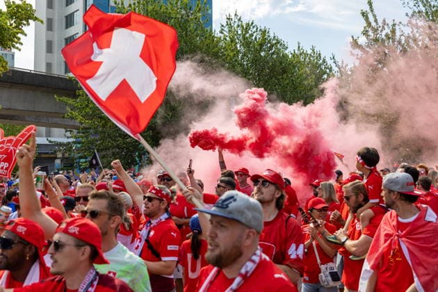 June 24, 2026, Vancouver, Bc, CANADA: Switzerland fans march toward B.C. Place before a World Cup Group B soccer match against Canada, in Vancouver, on Wednesday, June 24, 2026. Canada News - June 24, 2026  - ZUMAc35_ 20260624_zaf_c35_058 Copyright: xTimothyxMatweyx