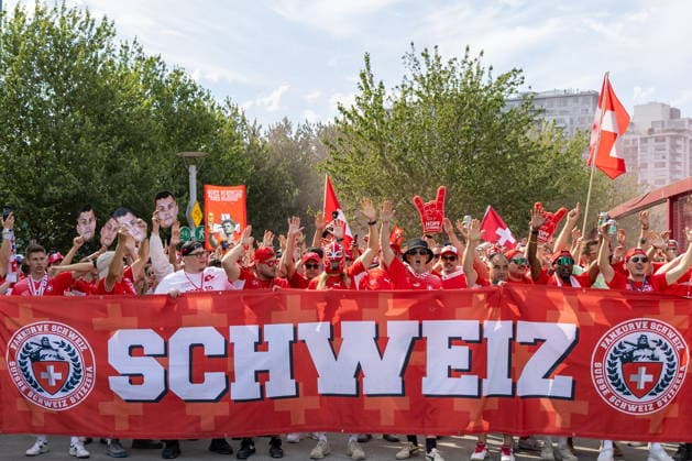 June 24, 2026, Vancouver, Bc, CANADA: Switzerland fans march toward B.C. Place before a World Cup Group B soccer match against Canada, in Vancouver, on Wednesday, June 24, 2026. Canada News - June 24, 2026  - ZUMAc35_ 20260624_zaf_c35_059 Copyright: xTimothyxMatweyx