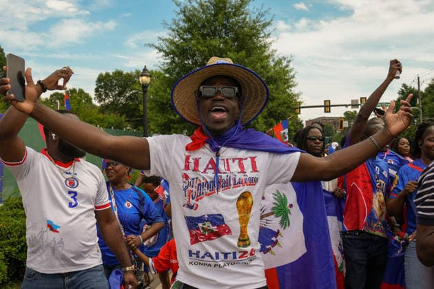June 24, 2026, Atlanta, Georgia, United States of America: Haiti fan pose for the camera during the Haiti fan march before the Morocco vs Haiti First Stage Group C match in ATLANTA, Georgia. Atlanta United States of America - ZUMAg276 20260624_zsp_g276_013 Copyright: xMalachixGabrielx