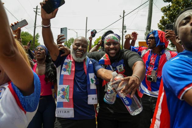 June 24, 2026, Atlanta, Georgia, United States of America: Two Haiti fans poses for the camera during the Haiti fan march before the Morocco vs Haiti First Stage Group C match in ATLANTA, Georgia. World Cup 2026: Group C: Morocco : Haiti  - ZUMAg276 20260624_zsp_g276_020 Copyright: xMalachixGabrielx