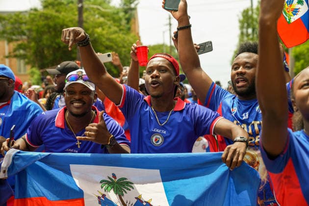 June 24, 2026, Atlanta, Georgia, United States of America: Haiti fans holding up the Haitian flag for the cameras during the Haiti fan march before the Morocco vs Haiti First Stage Group C match in ATLANTA, Georgia. World Cup 2026: Group C: Morocco : Haiti  - ZUMAg276 20260624_zsp_g276_021 Copyright: xMalachixGabrielx