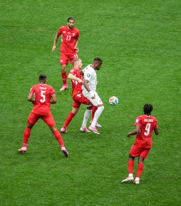 Switzerland v Canada - FIFA World Cup, WM, Weltmeisterschaft, Fussball 2026 - Group B VANCOUVER, CANADA - JUNE 24: Nico Elvedi (L) of Switzerland in action against Larin of Canada during the 2026 FIFA World Cup Group B match between Switzerland and Canada at BC Place Stadium in Vancouver, Canada, on June 24, 2026. Ercin Erturk Anadolu Vancouver Canada. Editorial use only. Please get in touch for any other usage.  Copyright: x2026xAnadoluxErcinxErturkx