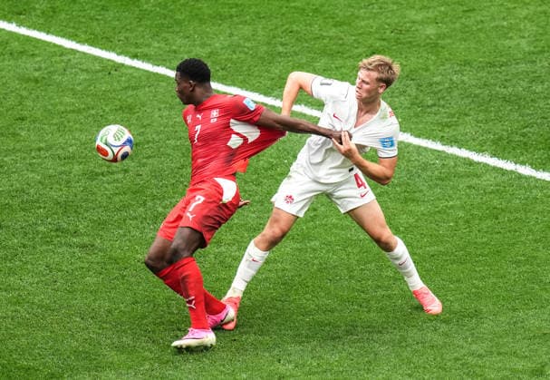 Switzerland v Canada - FIFA World Cup, WM, Weltmeisterschaft, Fussball 2026 - Group B VANCOUVER, CANADA - JUNE 24: Breel Embolo (7) of Switzerland in action against Luc De Fougerolles (4) of Canada during the 2026 FIFA World Cup Group B match between Switzerland and Canada at BC Place Stadium in Vancouver, Canada, on June 24, 2026. Ercin Erturk Anadolu Vancouver Canada. Editorial use only. Please get in touch for any other usage.  Copyright: x2026xAnadoluxErcinxErturkx