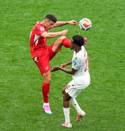 Switzerland v Canada - FIFA World Cup, WM, Weltmeisterschaft, Fussball 2026 - Group B VANCOUVER, CANADA - JUNE 24: Xhaka (L) of Switzerland in action during the 2026 FIFA World Cup Group B match between Switzerland and Canada at BC Place Stadium in Vancouver, Canada, on June 24, 2026. Ercin Erturk Anadolu Vancouver Canada. Editorial use only. Please get in touch for any other usage.  Copyright: x2026xAnadoluxErcinxErturkx
