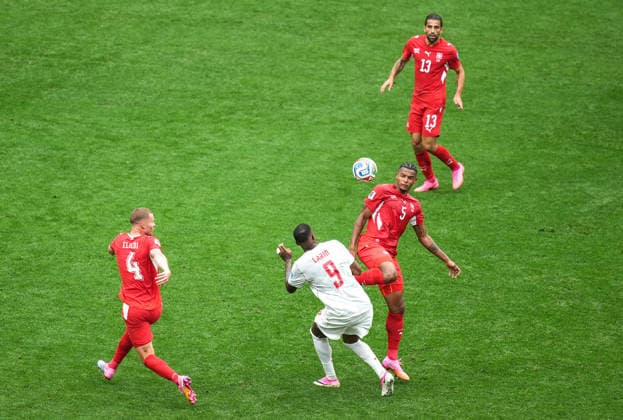 Switzerland v Canada - FIFA World Cup, WM, Weltmeisterschaft, Fussball 2026 - Group B VANCOUVER, CANADA - JUNE 24: Akanji (L) of Switzerland in action against Larin (9) of Canada during the 2026 FIFA World Cup Group B match between Switzerland and Canada at BC Place Stadium in Vancouver, Canada, on June 24, 2026. Ercin Erturk Anadolu Vancouver Canada. Editorial use only. Please get in touch for any other usage.  Copyright: x2026xAnadoluxErcinxErturkx