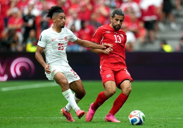 FIFA World Cup, WM, Weltmeisterschaft, Fussball 2026 - Group B - Switzerland vs Canada Ricardo Rodriguez of Switzerland (R) and Nathan Saliba of Canada in action during the FIFA World Cup 2026 group stage match Switzerland against Canada, in Vancouver, Canada, 24 June 2026. VANCOUVER Canada  Copyright: xBOBxFRIDx