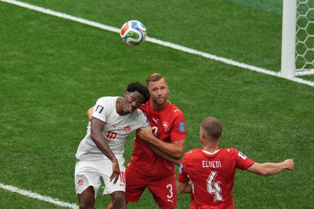 Switzerland v Canada - FIFA World Cup, WM, Weltmeisterschaft, Fussball 2026 - Group B VANCOUVER, CANADA - JUNE 24: Jonathan David of Canada in action against Silvan Widmer (3) of Switzerland during the 2026 FIFA World Cup Group B match between Switzerland and Canada at BC Place Stadium in Vancouver, Canada, on June 24, 2026. Ercin Erturk Anadolu Vancouver Canada. Editorial use only. Please get in touch for any other usage.  Copyright: x2026xAnadoluxErcinxErturkx