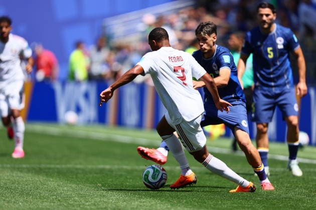Bosnia and Herzegovina v Qatar - FIFA World Cup, WM, Weltmeisterschaft, Fussball 2026 - Group B SEATTLE, USA - JUNE 24: Pedro Miguel (2) of Qatar in action against Kerim Alajbegovic (19) of Bosnia and Herzegovina during the 2026 FIFA World Cup First Stage Group B match between Bosnia and Herzegovina and Qatar at Lumen Field (Seattle Stadium) in Seattle, Washington, United States on June 24, 2026. Samah Zidan Anadolu Seattle United States. Editorial use only. Please get in touch for any other usage.  Copyright: x2026xAnadoluxSamahxZidanx