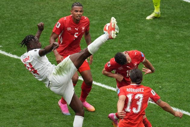 Switzerland v Canada - FIFA World Cup, WM, Weltmeisterschaft, Fussball 2026 - Group B VANCOUVER, CANADA - JUNE 24: Akanji (5) of Switzerland in action against Promise David (24) of Canada during the 2026 FIFA World Cup Group B match between Switzerland and Canada at BC Place Stadium in Vancouver, Canada, on June 24, 2026. Ercin Erturk Anadolu British Columbia Canada. Editorial use only. Please get in touch for any other usage.  Copyright: x2026xAnadoluxErcinxErturkx