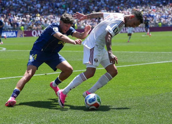(260625) -- SEATTLE, June 25, 2026 -- Arjan Malic (L) of Bosnia and Herzegovina vies with Edmilson Junior of Qatar during the group B match between Bosnia and Herzegovina and Qatar at the 2026 FIFA World Cup, WM, Weltmeisterschaft, Fussball at Seattle Stadium in Seattle, the United States, June 24, 2026. ) (SP)U.S.-SEATTLE-FOOTBALL-FIFA WORLD CUP-GROUP B-BIH VS QAT PengxZiyang 