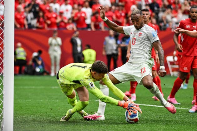 Goalkeeper Gregor Kobel of Switzerland and Derek Cornelius of Canada, Switzerland v Canada, Group B football match of the FIFA World Cup, WM, Weltmeisterschaft, Fussball 2026 at BC Place, Vancouver, Canada on Wednesday 24 June 2026. Photo: Andrew Cornaga Vancouver Canada Copyright: xAndrewxCornaga x