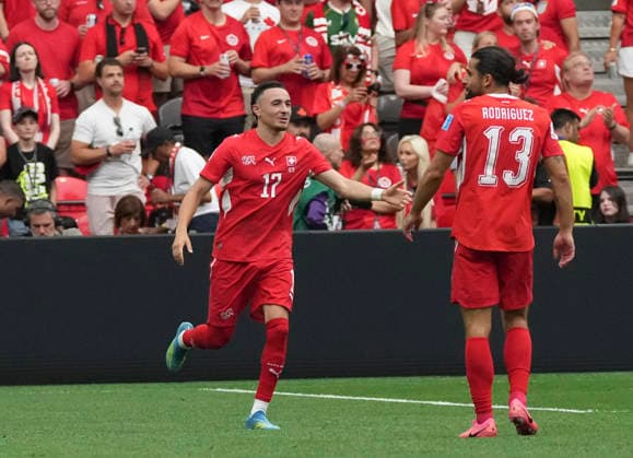(260625) -- VANCOUVER, June 25, 2026 -- Ruben Vargas (L) of Switzerland celebrates a goal during the group B match between Switzerland and Canada at the 2026 FIFA World Cup, WM, Weltmeisterschaft, Fussball at BC Place Vancouver in Vancouver, Canada, June 24, 2026. ) (SP)CANADA-VANCOUVER-FOOTBALL-FIFA WORLD CUP-GROUP B-SUI VS CAN MengxYongmin 