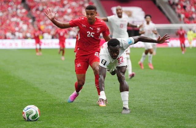 June 24, 2026, Vancouver, Bc, CANADA: Canada s Richie Laryea (22) stumbles in front of Switzerland s Luca Jaquez (25) during the first half of a World Cup Group B soccer match, in Vancouver, on Wednesday, June 24, 2026. Canada News - June 24, 2026  - ZUMAc35_ 20260624_zaf_c35_116 Copyright: xDarrylxDyckx