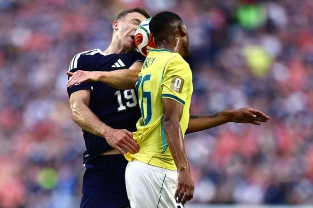 Lewis Ferguson of Scotland and Rayan of Brazil Scotland v Brazil, 2026 FIFA World Cup, WM, Weltmeisterschaft, Fussball Group C, Football, Miami Stadium, Miami, Florida, USA - 24 Jun 2026Miami Miami Stadium Florida (FL) United States of America EDITORIAL USE ONLY No use with unauthorised audio, video, data, fixture lists, club league logos or live services. Online in-match use limited to 120 images, no video emulation. No use in betting, games or single club league player publications.  Copyright: xMichaelxZemanek Shutterstockx 16956031ad