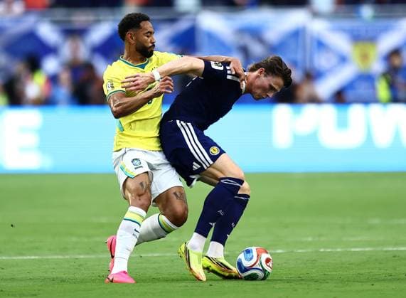 Matheus Cunha of Brazil and Scott McTominay of Scotland Scotland v Brazil, 2026 FIFA World Cup, WM, Weltmeisterschaft, Fussball Group C, Football, Miami Stadium, Miami, Florida, USA - 24 Jun 2026Miami Miami Stadium Florida (FL) United States of America EDITORIAL USE ONLY No use with unauthorised audio, video, data, fixture lists, club league logos or live services. Online in-match use limited to 120 images, no video emulation. No use in betting, games or single club league player publications.  Copyright: xMichaelxZemanek Shutterstockx 16956031am