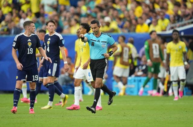 Referee Cesar Ramos (Mexico) gestures during Scotland and Brazil, Group L FIFA World Cup, WM, Weltmeisterschaft, Fussball 2026, Miami Stadium, Boston, USA on June 24, 2026. Thor Wegner DeFodi Images. (Photo by DeFodi Images) - *** Referee Cesar Ramos of Mexico gestures during the Scotland vs. Brazil match in Group L of the 2026 FIFA World Cup at Miami Stadium in Boston, USA, on June 24, 2026. Photo by DeFodi Images (Thor Wegner)