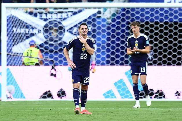 Kenny McLean and Jack Hendry of Scotland dejected Scotland v Brazil, 2026 FIFA World Cup, WM, Weltmeisterschaft, Fussball Group C, Football, Miami Stadium, Miami, Florida, USA - 24 Jun 2026Miami Miami Stadium Florida (FL) United States of America EDITORIAL USE ONLY No use with unauthorised audio, video, data, fixture lists, club league logos or live services. Online in-match use limited to 120 images, no video emulation. No use in betting, games or single club league player publications.  Copyright: xMichaelxZemanek Shutterstockx 16956031bc
