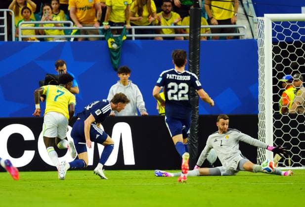 Angus Gunn of Scotland saves from Vinicius Junior of Brazil Scotland v Brazil, 2026 FIFA World Cup, WM, Weltmeisterschaft, Fussball Group C, Football, Miami Stadium, Miami, Florida, USA - 24 Jun 2026Miami Miami Stadium Florida (FL) United States of America EDITORIAL USE ONLY No use with unauthorised audio, video, data, fixture lists, club league logos or live services. Online in-match use limited to 120 images, no video emulation. No use in betting, games or single club league player publications.  Copyright: xJavierxGarcia Shutterstockx 16956030cz