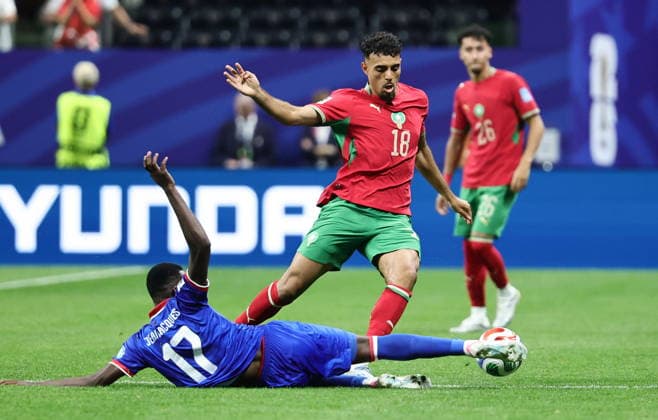 FIFA World Cup, WM, Weltmeisterschaft, Fussball 2026 - Group C - Morocco vs Haiti Chadi Riad of Morocco (R) and Danley Jean Jacques of Haiti (L) in action during the FIFA World Cup 2026 group stage match Morocco against Haiti, in Atlanta, Georgia, USA, 24 June 2026. ATLANTA United States  Copyright: xRONALDxWITTEKx