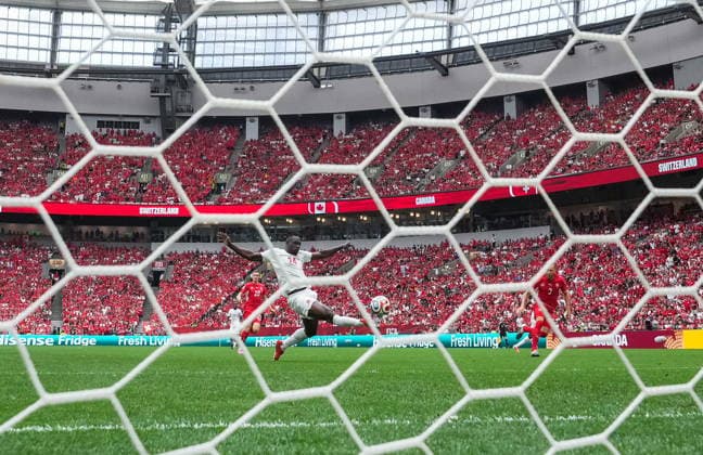 June 24, 2026, Vancouver, Bc, CANADA: Canada s Promise David (24) scores during the second half of a World Cup Group B soccer match against Switzerland, in Vancouver, on Wednesday, June 24, 2026. Canada News - June 24, 2026  - ZUMAc35_ 20260624_zaf_c35_169 Copyright: xDarrylxDyckx