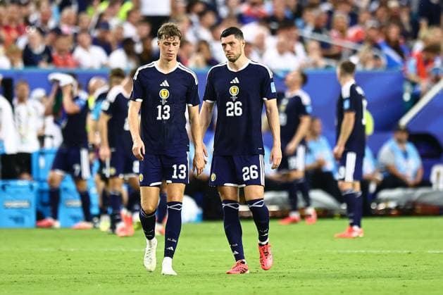 Scott McKenna and Jack Hendry of Scotland dejected Scotland v Brazil, 2026 FIFA World Cup, WM, Weltmeisterschaft, Fussball Group C, Football, Miami Stadium, Miami, Florida, USA - 24 Jun 2026Miami Miami Stadium Florida (FL) United States of America EDITORIAL USE ONLY No use with unauthorised audio, video, data, fixture lists, club league logos or live services. Online in-match use limited to 120 images, no video emulation. No use in betting, games or single club league player publications.  Copyright: xMichaelxZemanek Shutterstockx 16956031ds