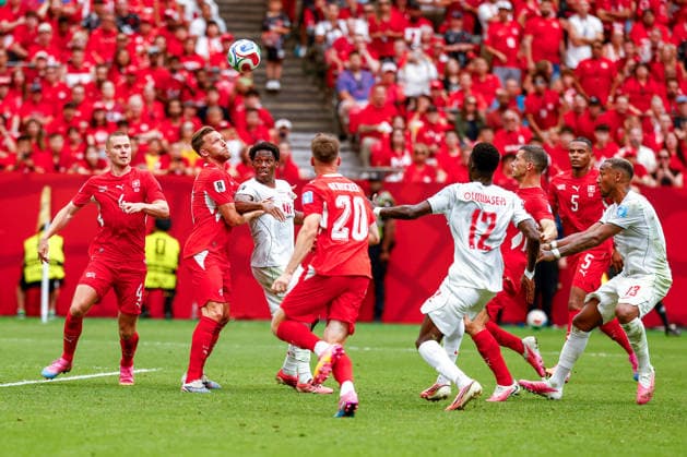 June 24, 2026, Vancouver, British Columbia, Canada: JONATHON DAVID (10) of Canada being held by a Swiss defender. Canada vs. Switzerland in FIFA World Cup, WM, Weltmeisterschaft, Fussball group stage play held at BC Place Stadium in Vancouver, BC Canada 2026 Soccer: Canada 1:2 Switzerland  - ZUMAk184 20260624_zsp_k184_031 Copyright: xGordonxKalischx
