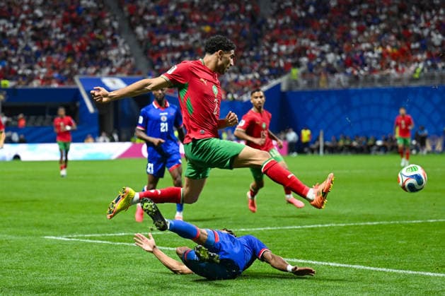 ATLANTA, GA - JUNE 24: Achraf Hakimi 2 of Morocco hurdles Martin Experience 8 of Haiti during the FIFA World Cup, WM, Weltmeisterschaft, Fussball 2026 Group C match between Morocco and Haiti on June 24th, 2026 at Atlanta Stadium in Atlanta, GA. (Photo by Rich von Biberstein Icon Sportswire) SOCCER: JUN 24 FIFA World Cup 26 Group C - Morocco vs Haiti EDITORIAL USE ONLY Icon260624021