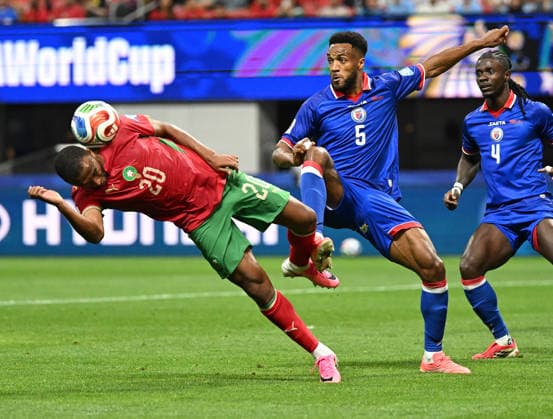 (260625) -- ATLANTA, June 25, 2026 -- Ayoub El Kaabi (L) of Morocco vies with Hannes Delcroix (C) of Haiti during the group C match between Morocco and Haiti at the 2026 FIFA World Cup, WM, Weltmeisterschaft, Fussball at Atlanta Stadium in Atlanta, the United States, June 24, 2026. ) (SP)U.S.-ATLANTA-FOOTBALL-FIFA WORLD CUP-GROUP C-MAR VS HTI JuxHuanzong 