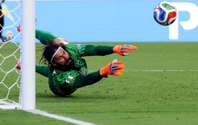 (260625) -- MIAMI, June 25, 2026 -- Alisson, goalkeeper of Brazil, saves a ball during the group C match between Scotland and Brazil at the 2026 FIFA World Cup, WM, Weltmeisterschaft, Fussball at Miami Stadium, Miami, the United States, June 24, 2026. ) (SP)U.S.-MIAMI-FOOTBALL-FIFA WORLD CUP-GROUP C-SCO VS BRA XuxZijian 